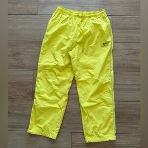 nike yellow tracksuit bottoms